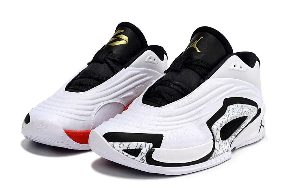 Front view of white Jordan Luka 3 shoes with black laces and trim
