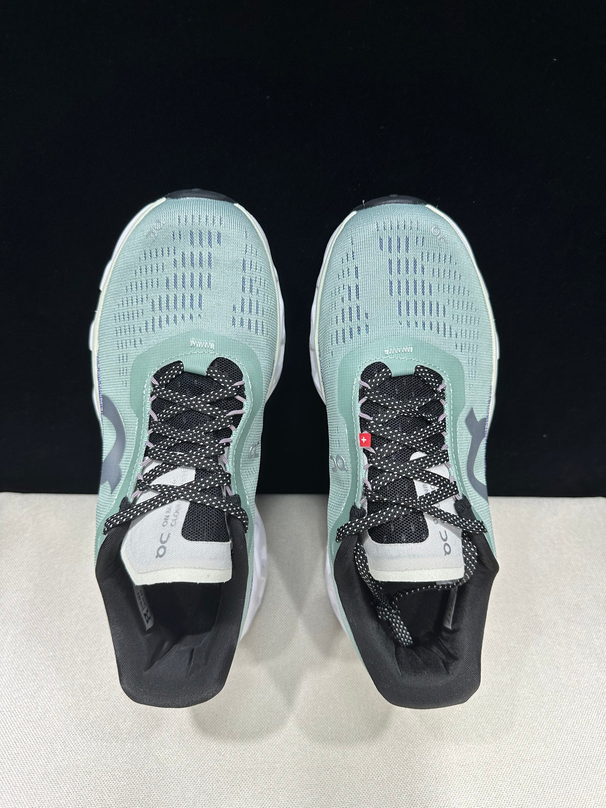 Top-down view showing the perforated uppers and lace details.