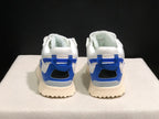 Rear view of the pair showing blue heel details, padded collars, black heel openings, and textured outsoles.