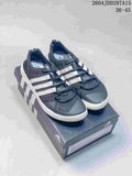 Pair of navy and white adidas Terrex CC Boat shoes displayed on an adidas shoe box; the image shows style code 2604JDD297A15 and size range 36–45.