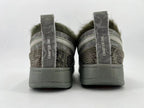 Rear view showing heel pull tabs marked “CHAPTER ONE”