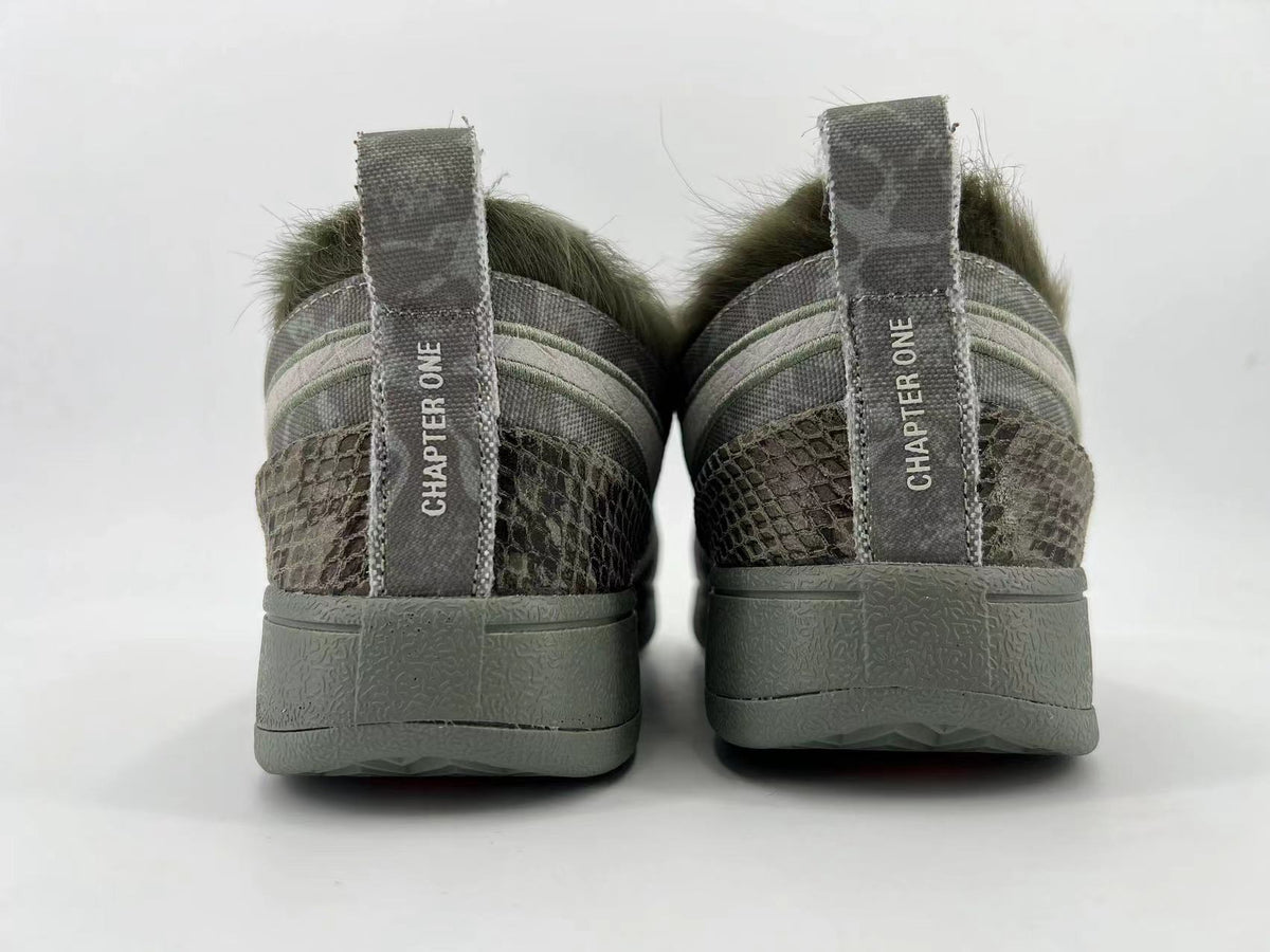 Rear view showing heel pull tabs marked “CHAPTER ONE”