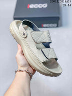Close-up side view of a cream ECCO sandal showing two adjustable straps and a textured outsole.