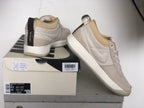 Nike Book 1 Ashen Slate shoes beside a labeled box; the label shows model and size information.