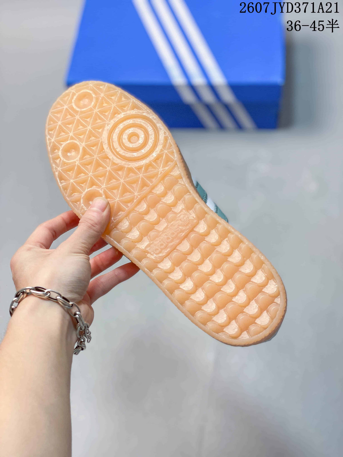 Close-up of the translucent gum-colored outsole with a textured traction pattern.