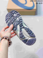 Underside view of an ASICS Gel-Kahana 8 FL sneaker showing the segmented lugged outsole pattern.