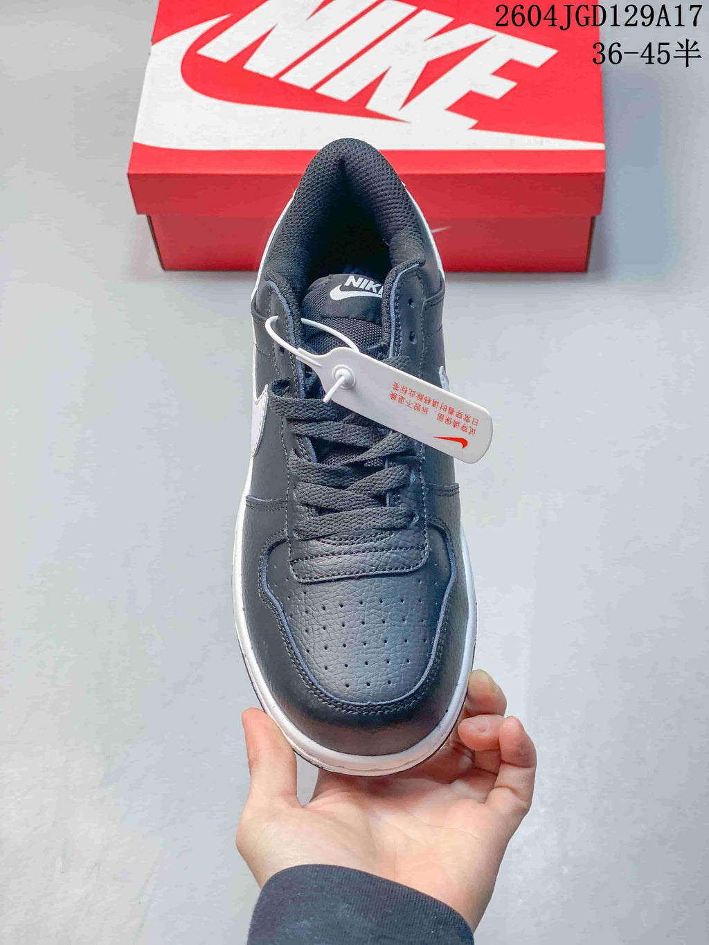 Top view of the lace-up sneaker showing its perforated toe area