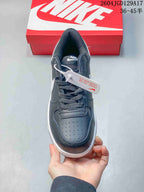 Top view of the lace-up sneaker showing its perforated toe area