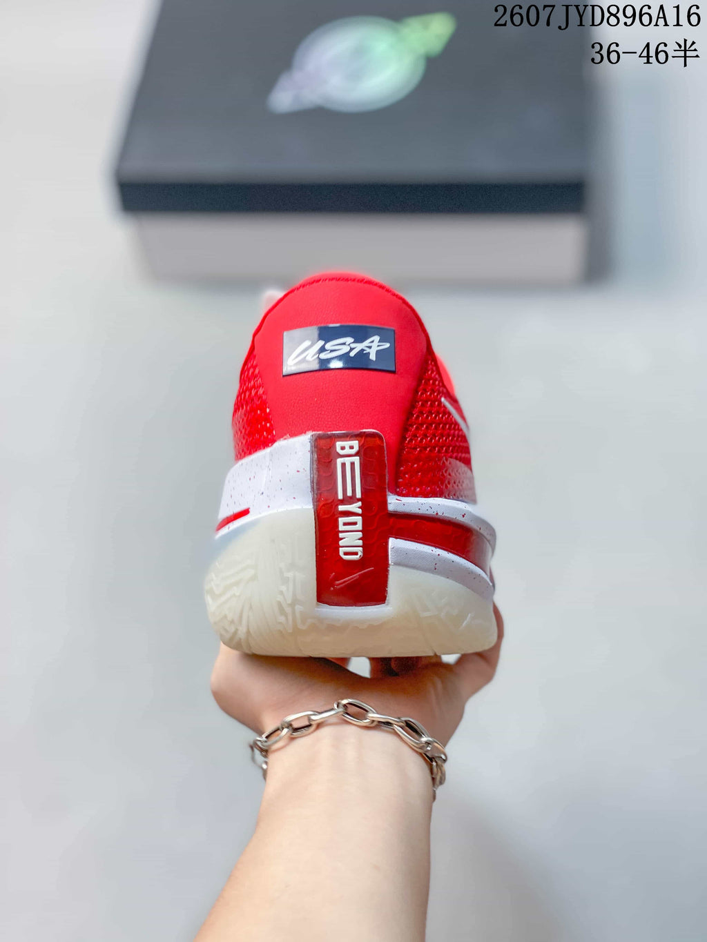 Rear view of the red basketball shoe showing the padded heel, white heel structure and vertical red detail.