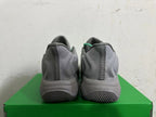Rear view of grey Nike KD 4 basketball shoes with green accents