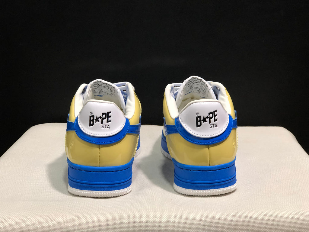 Rear view showing the yellow heels, blue trim, and BAPE STA heel branding