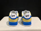 Rear view showing the yellow heels, blue trim, and BAPE STA heel branding