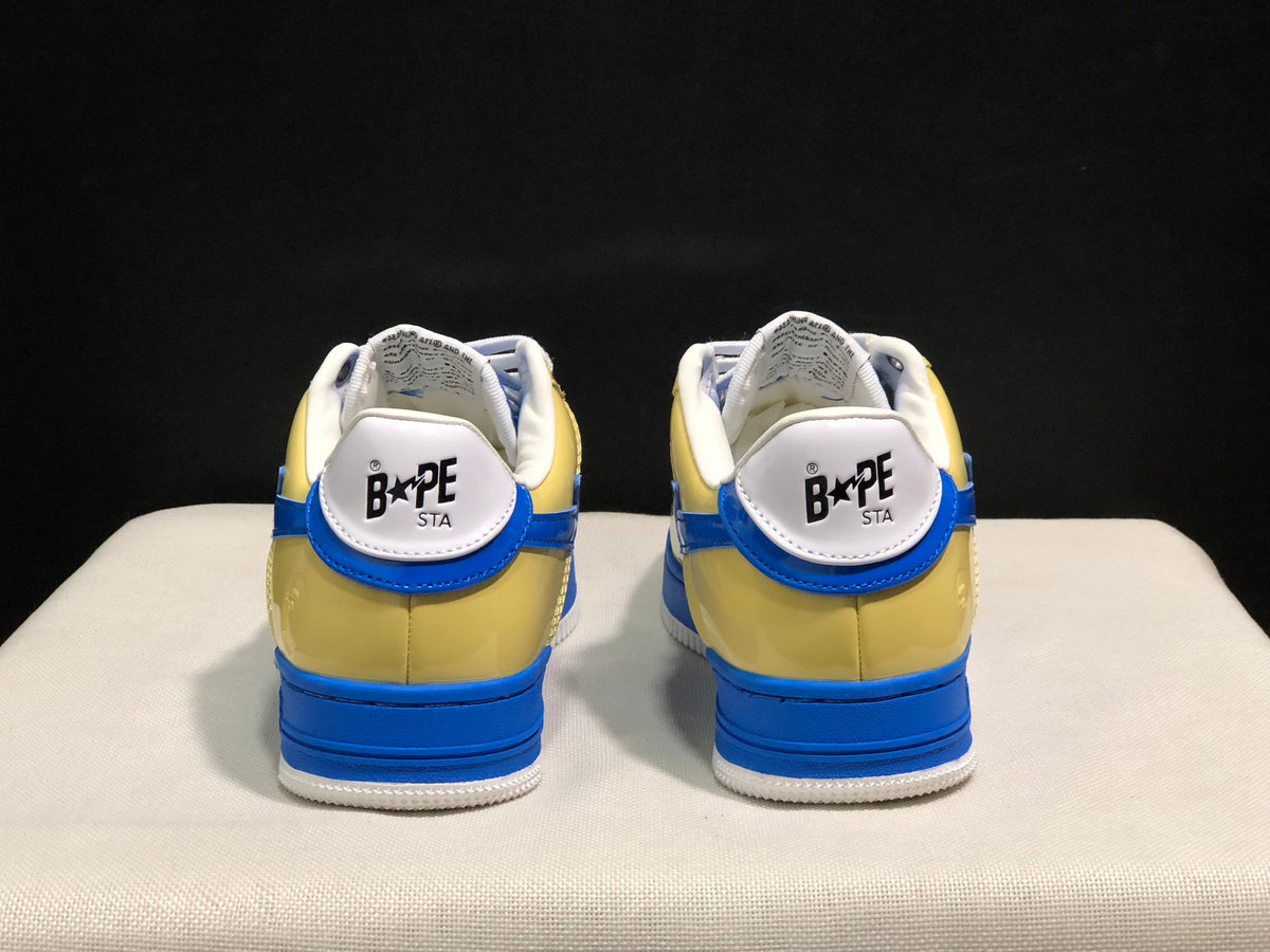 Rear view showing the yellow heels, blue trim, and BAPE STA heel branding