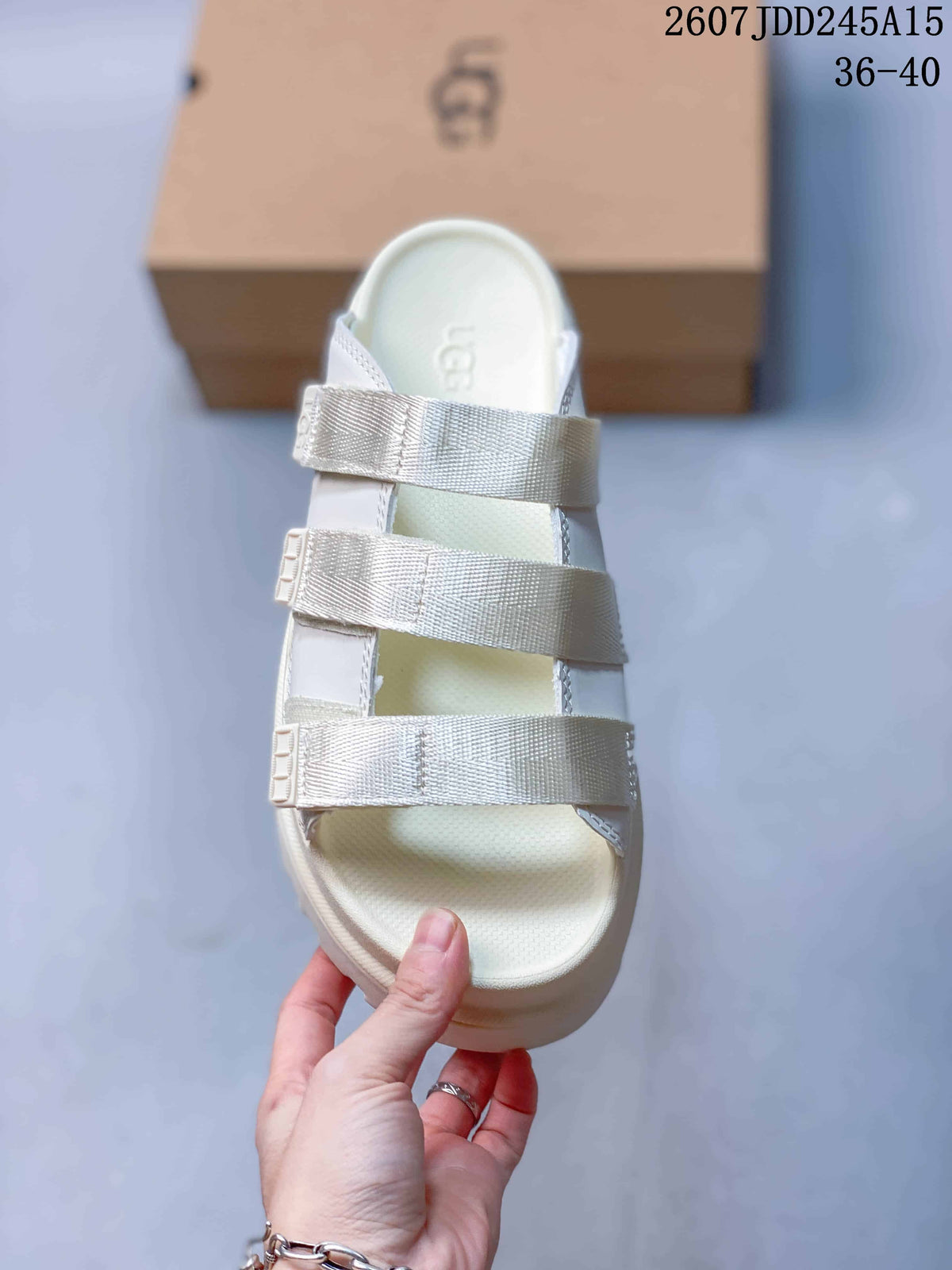 Top view of the white sandal showing the open toe, contoured footbed, and three adjustable straps.