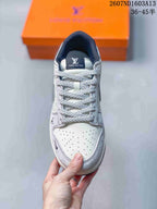 Top view showing woven laces, perforated toe box, and Louis Vuitton-branded tongue label.