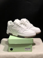 Pair of white Off-White Out Of Office sneakers displayed on a pale green shoe box; the box label shows size 41.