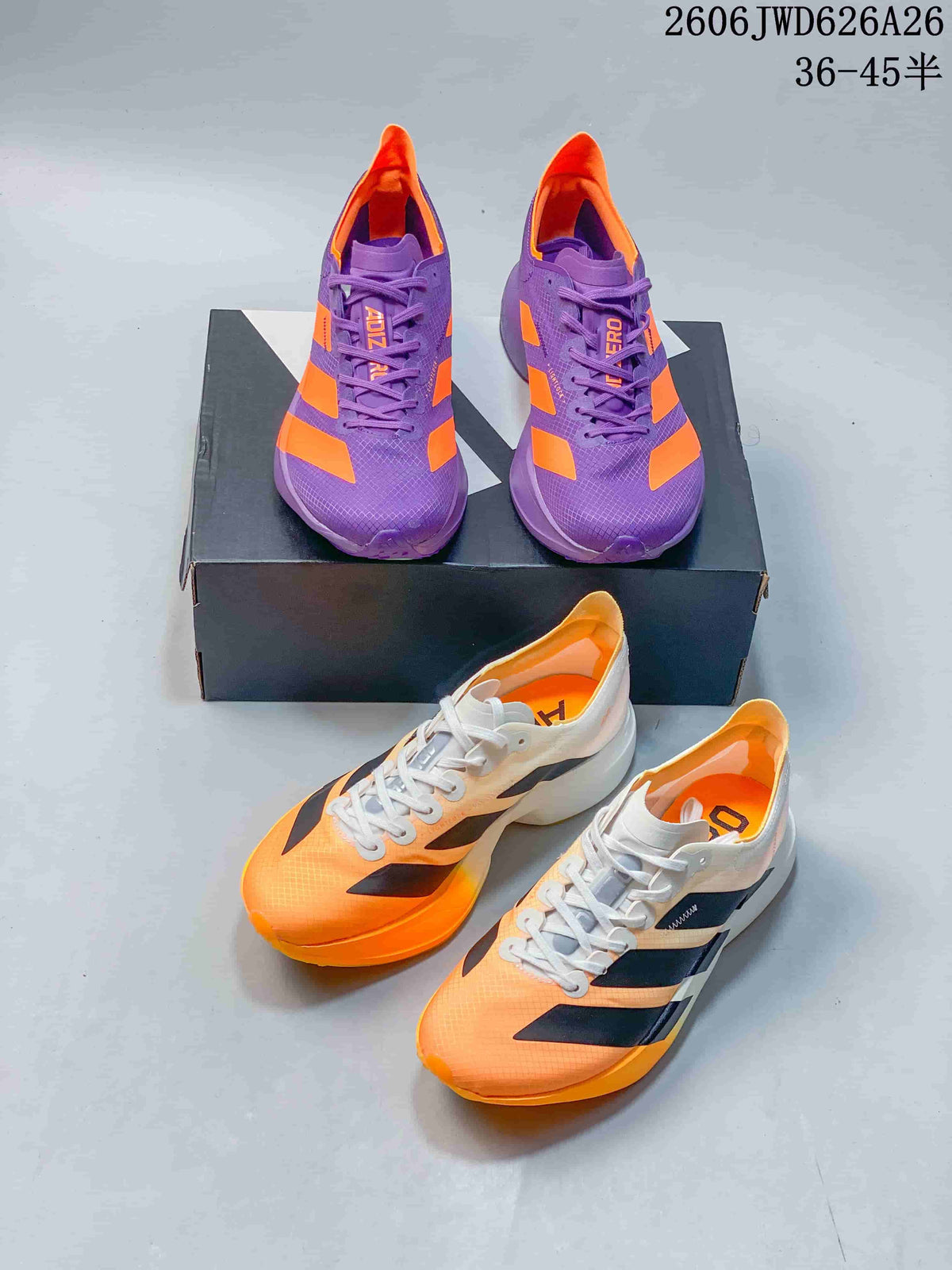 Purple and orange shoes and orange, black, and white shoes shown together.