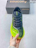 Front view showing the laces, gray upper, and yellow side accents