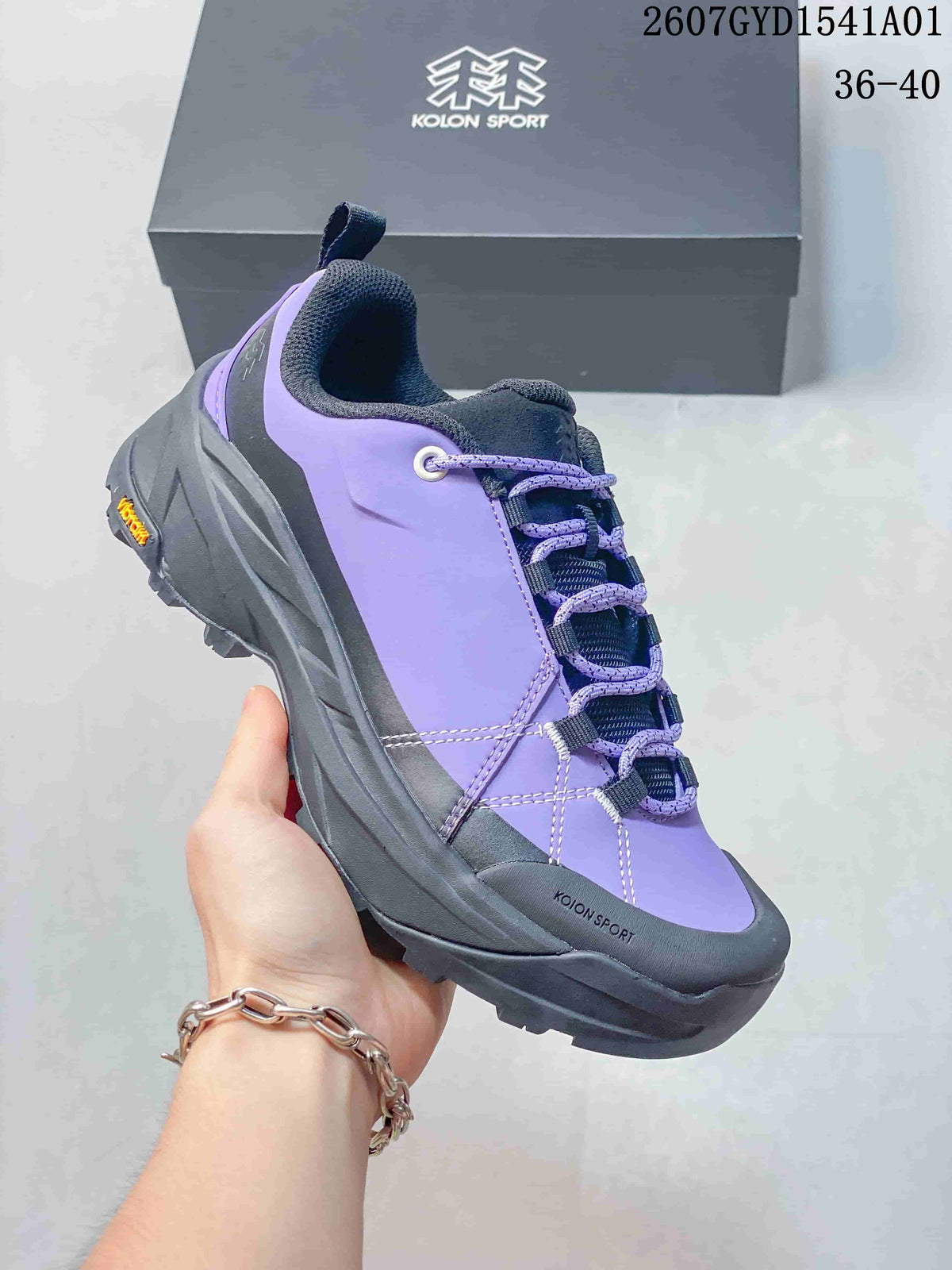 Close-up of the purple sneaker showing its side profile and lacing