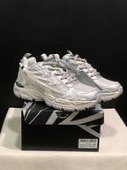 White and grey Off-White Be Right Back sneakers displayed on a black-and-white branded shoe box, shown from a three-quarter front angle.