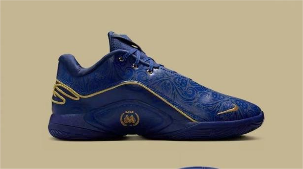 Side view of a blue Nike LeBron 22 basketball shoe with patterned panels and gold-tone accents