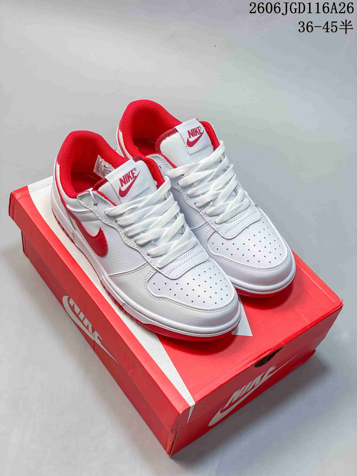 Pair of white and red Nike Big Low low-top sneakers shown on a red Nike box