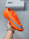 Orange Nike soccer cleat with a blue and silver Swoosh-style side detail and molded studs.