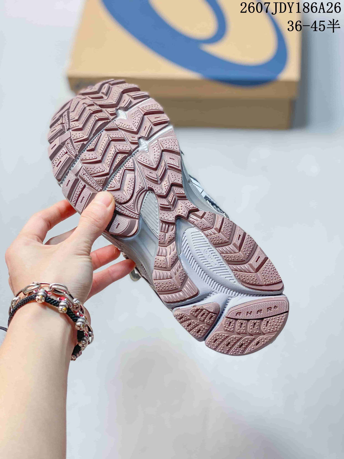 Close-up of the pink-toned treaded outsole on an ASICS Gel-Kahana 8 FL sneaker, with the shoebox in the background and size range 36–45 visible.