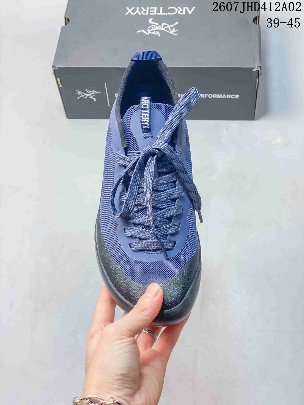 Front view showing the laces and reinforced-looking toe area