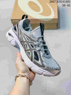Angled view of a silver-toned ASICS GT-2160 Breeze sneaker with open mesh panels and a sculpted outsole.