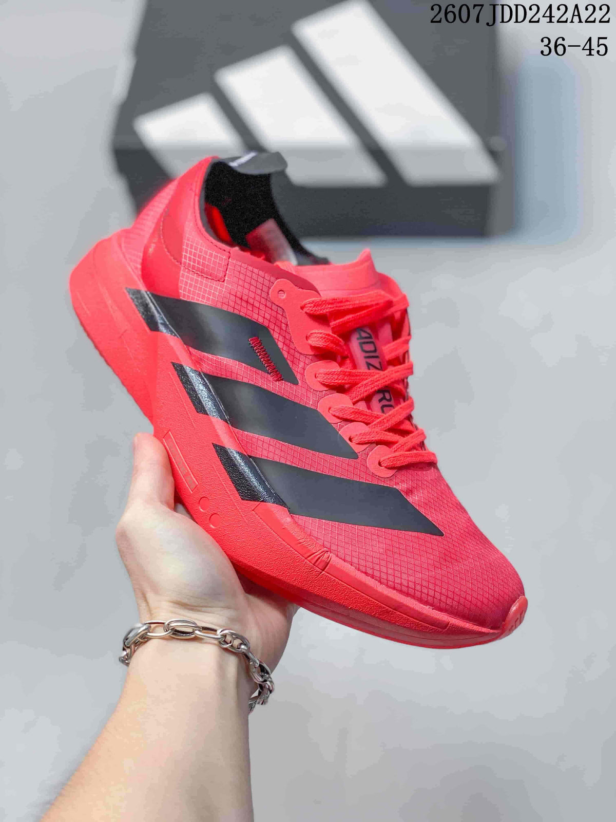 Red Y-3 Adios Pro 4 sneaker with black side overlays; image text shows JDD242A22 and sizes 36–45.