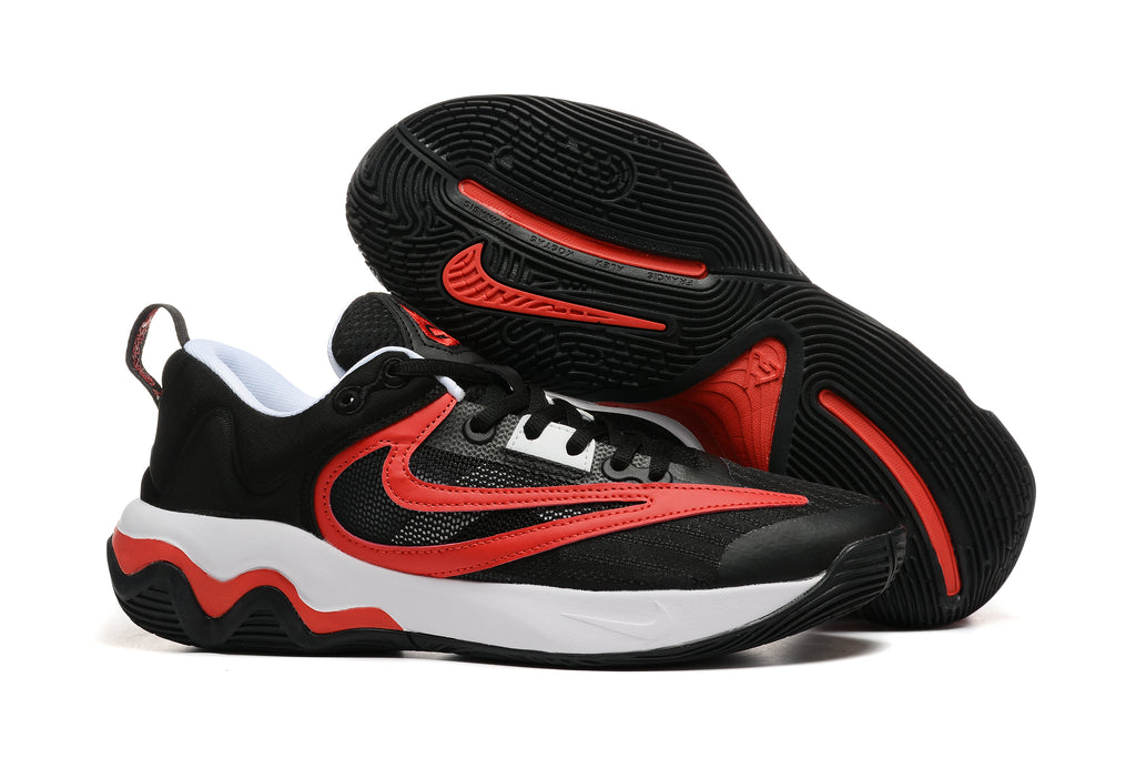 Black basketball shoe with red accents and white midsole