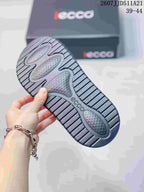 Close-up of the sandal outsole showing a patterned central section and deep horizontal tread.