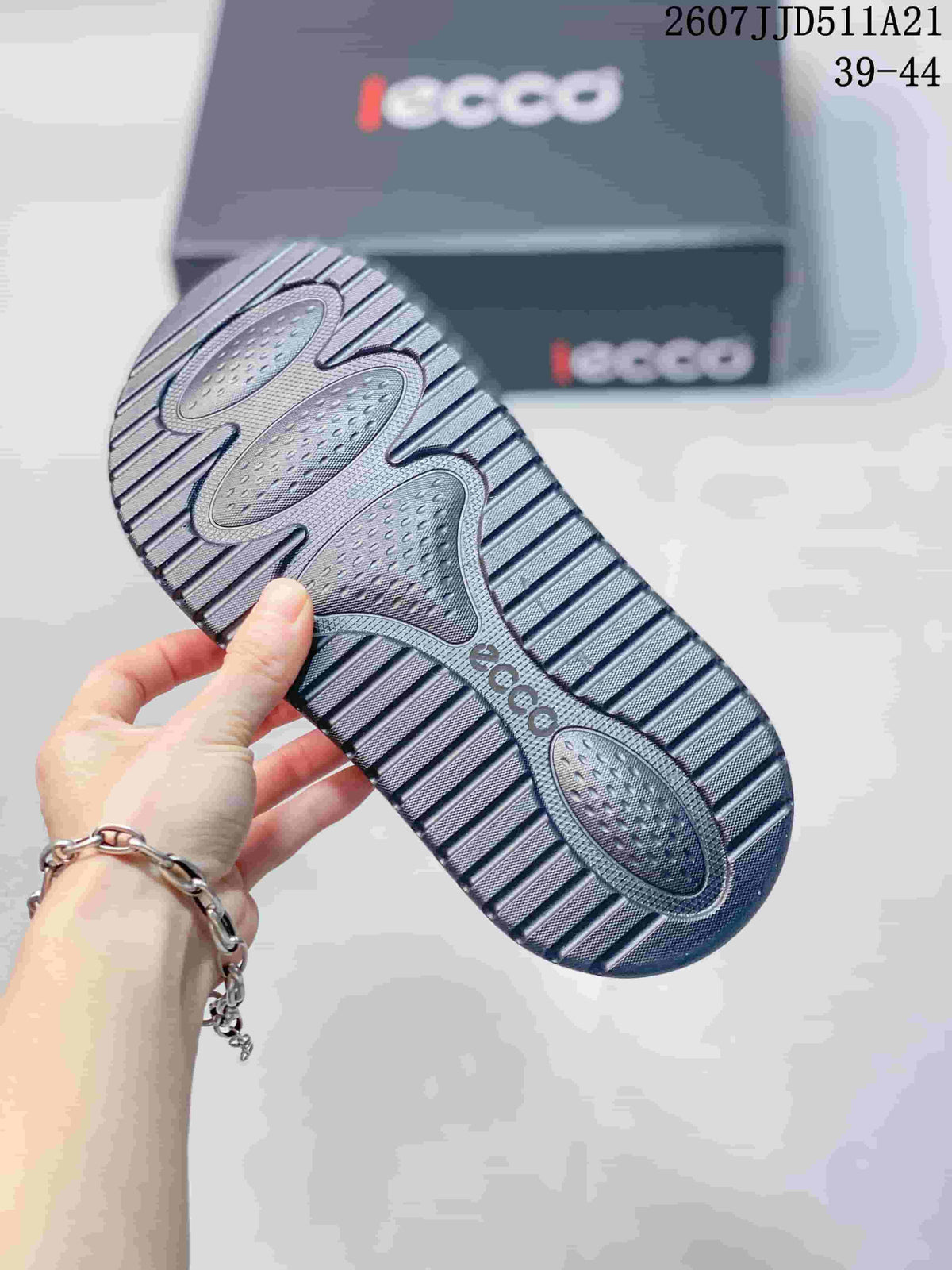 Close-up of the sandal outsole showing a patterned central section and deep horizontal tread.
