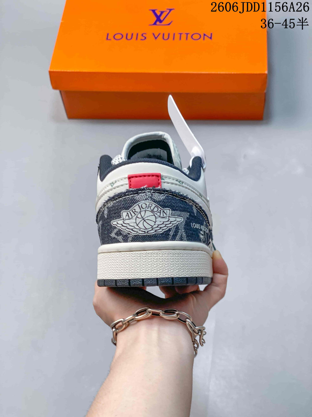 Rear view showing the Air Jordan winged logo on a dark patterned heel panel and a white midsole.