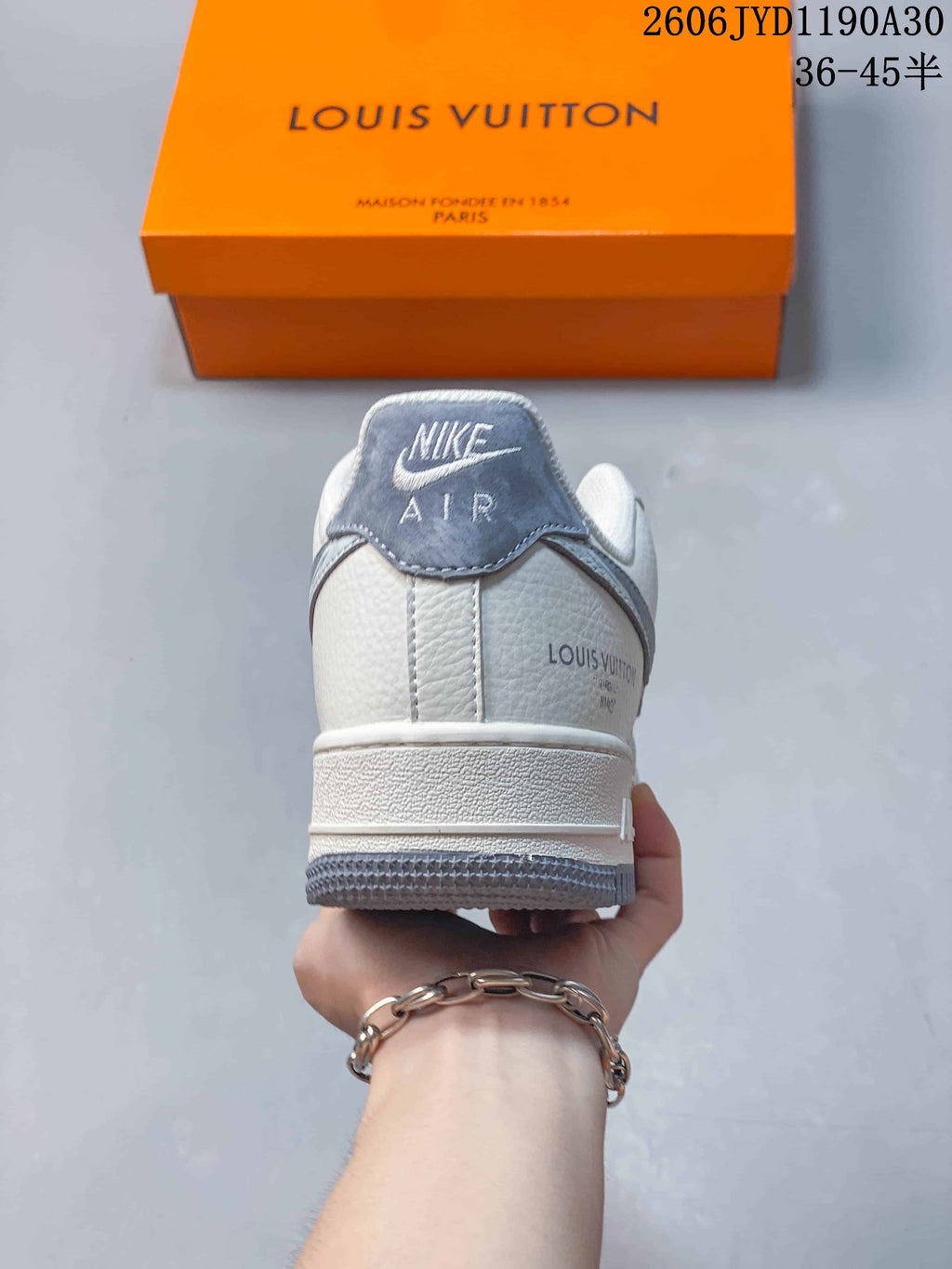 Rear view showing the heel, gray heel tab, and printed branding