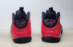 Rear view of red and black Nike Foamposite Pro sneakers