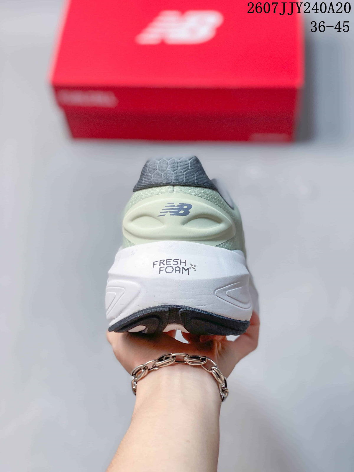 Rear view showing the New Balance logo and Fresh Foam X branding on the heel.