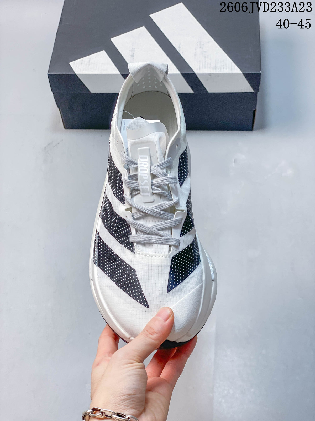 Top view showing the laces and navy dotted stripe details