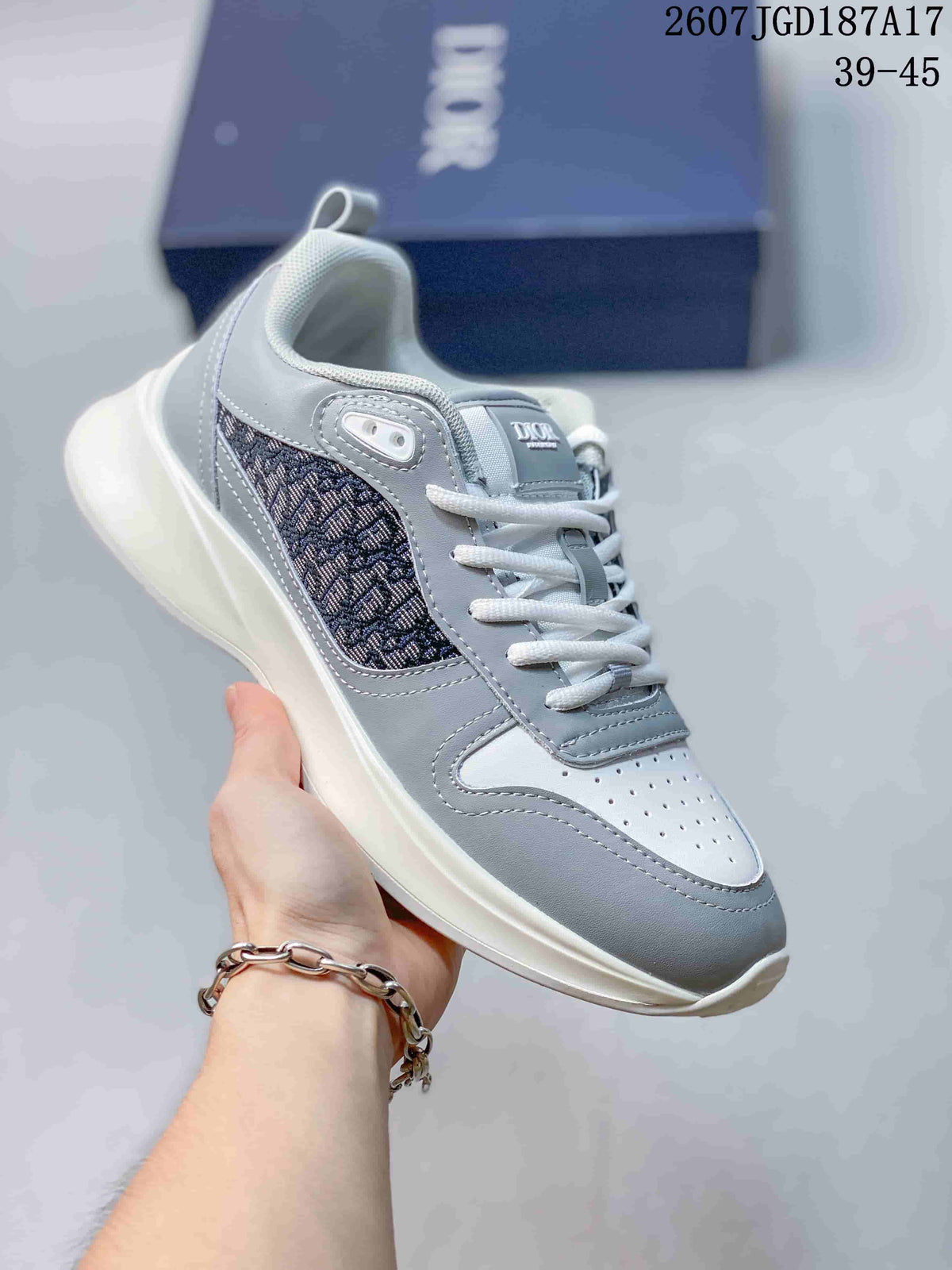 Light gray Dior B25 Runner sneaker with a dark patterned side panel and white outsole.