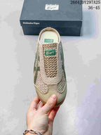 Top view of the sneaker showing the beige upper, green accents and Onitsuka Tiger tongue label.