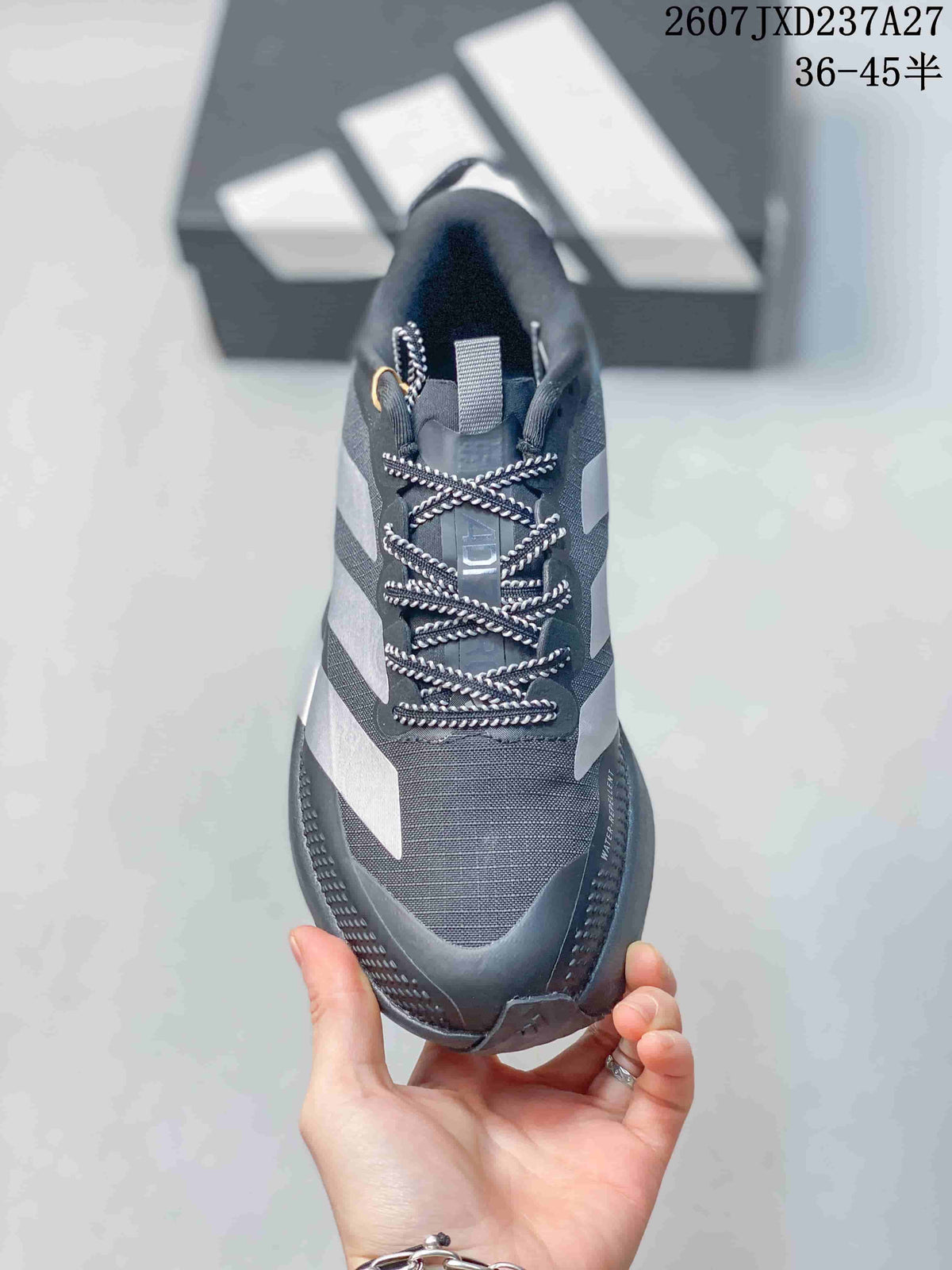 Top view of the sneaker showing the mesh toe box, padded tongue, and patterned laces.