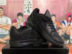 Two black basketball shoes shown from the side and at an angle