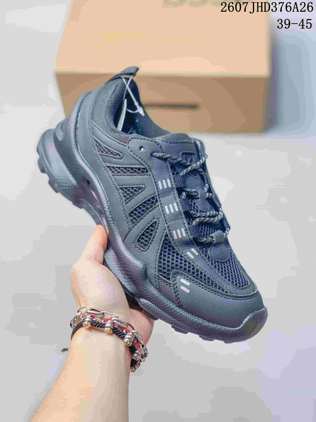 Three-quarter side view of the dark gray ECCO sneaker showing the layered upper and rugged outsole.