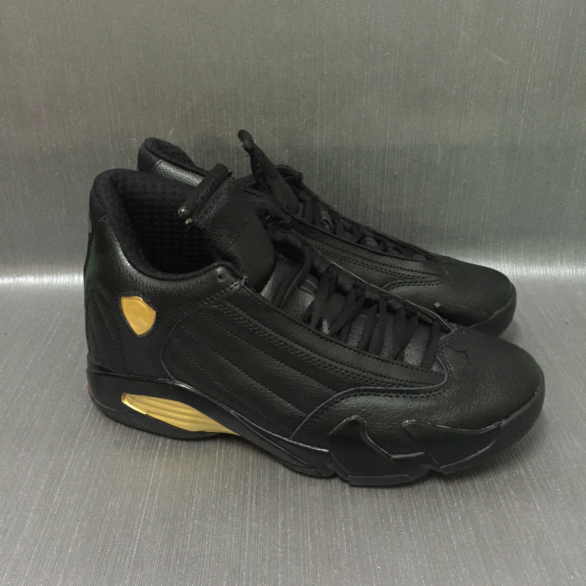 Jordan Air Jordan 14 Black and Gold High-Top Sneakers