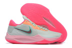 Pale gray basketball shoe with pink, teal, and coral accents and a pink outsole.