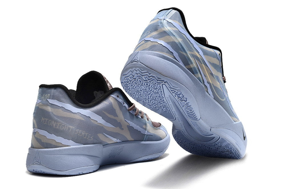 Blue-gray Ja 2 shoes shown from the heel and outsole.