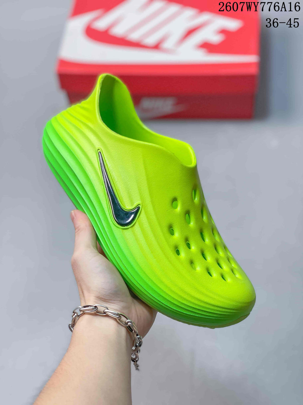 Angled close view of the neon green clog showing the molded upper, ventilation holes, dark Nike Swoosh, and layered side detailing.