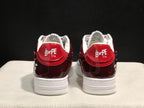 Rear view showing the burgundy heel panels and Bape Sta branding.