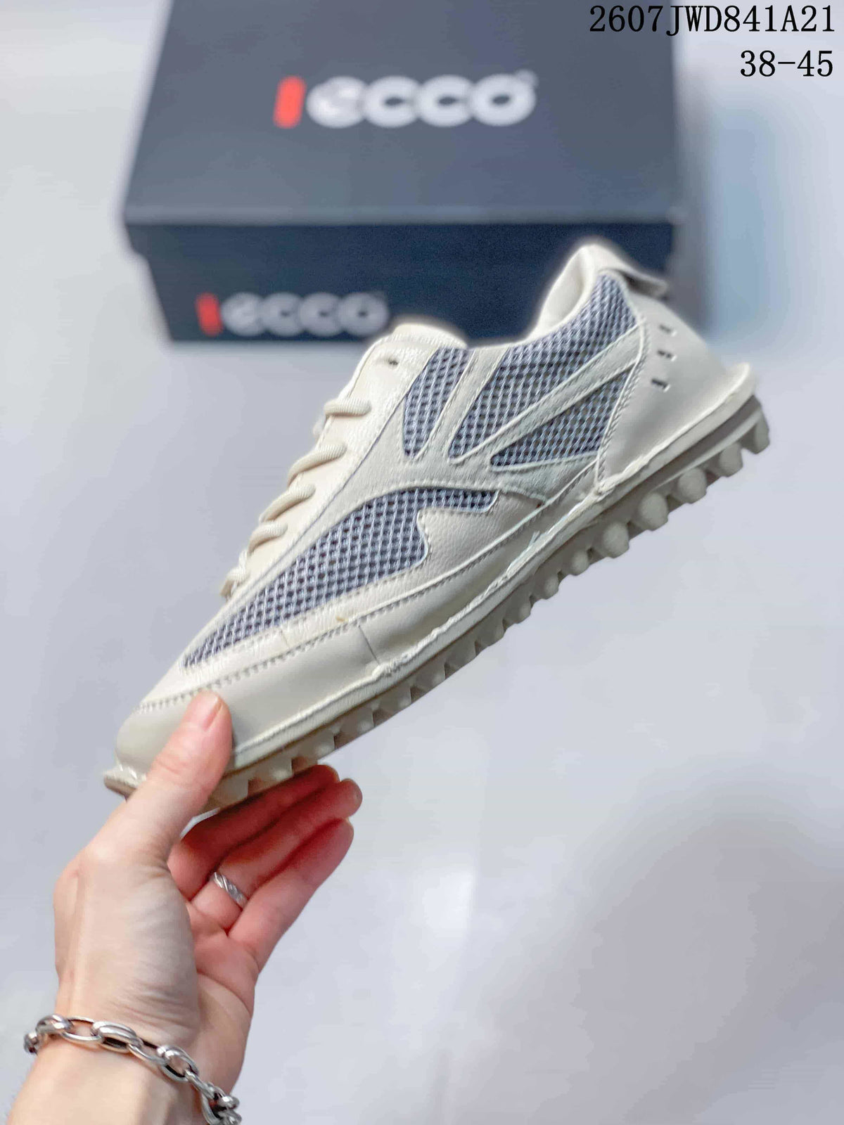 Side view highlighting the white and gray mesh panels, lace-up construction, and raised outsole tread.